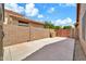 The backyard has block wall fencing offering privacy at 7214 W Crest Ln, Glendale, AZ 85310