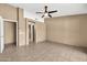 Spacious bedroom with neutral colors and tile floors at 7214 W Crest Ln, Glendale, AZ 85310