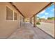 Long covered patio for relaxing and entertaining at 7214 W Crest Ln, Glendale, AZ 85310