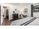 Bedroom with nice tile flooring, desk and bed features black and white theme at 7777 E Main St # 143, Scottsdale, AZ 85251
