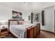 Bedroom features a luxurious king bed, side tables and art that makes this room stand out at 7777 E Main St # 143, Scottsdale, AZ 85251
