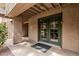Exterior of the community fitness center with double doors and welcome mat at 7777 E Main St # 143, Scottsdale, AZ 85251