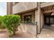 Private patio with decorative rock and mature landscaping for shade and privacy at 7777 E Main St # 143, Scottsdale, AZ 85251
