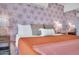 Cozy bedroom featuring stylish decor, soft lighting, and a calming color palette at 8614 E Rose Ln, Scottsdale, AZ 85250