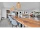 Open-concept great room connects dining, kitchen, and living spaces, perfect for modern living at 8614 E Rose Ln, Scottsdale, AZ 85250