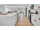 Well-equipped kitchen with an island, modern appliances, lots of cabinets and seating, creating a functional and stylish space at 8614 E Rose Ln, Scottsdale, AZ 85250