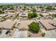 Bird's-eye view of a home with a private backyard oasis, including a pool and manicured landscaping at 8738 W Runion Dr, Peoria, AZ 85382