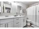 Bright bathroom with double sinks, white cabinets, and modern fixtures offers a clean, contemporary style at 8738 W Runion Dr, Peoria, AZ 85382