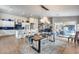 Open-concept dining room leading to a spacious kitchen and patio at 8738 W Runion Dr, Peoria, AZ 85382