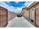 Wide driveway and gated entrance with a spacious side yard to provide privacy and convenience at 8738 W Runion Dr, Peoria, AZ 85382