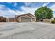 Spacious property featuring a three-car garage and a secure gated entrance, enhancing privacy at 8738 W Runion Dr, Peoria, AZ 85382