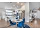 Bright kitchen with white cabinets, stainless appliances, and a large island perfect for entertaining at 8738 W Runion Dr, Peoria, AZ 85382