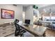 Home office area with a glass desk, and modern decor at 8738 W Runion Dr, Peoria, AZ 85382