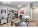 Well-lit office featuring custom cabinetry and desk, plus decor at 8738 W Runion Dr, Peoria, AZ 85382