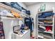 Organized walk-in closet with shelves, hanging rods, and storage, offering ample space for clothes and accessories at 8738 W Runion Dr, Peoria, AZ 85382