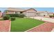 Welcoming single-story home with a manicured lawn and desert landscaping and attached garage at 10521 W Ross Ave, Peoria, AZ 85382
