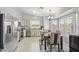 Charming kitchen with stainless steel appliances, breakfast nook, and natural light at 10521 W Ross Ave, Peoria, AZ 85382