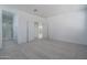 Neutral bedroom with carpeting, closet, an adjacent bathroom at 1057 S 151St Ln, Goodyear, AZ 85338