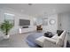 Cozy living room with stylish furnishings, recessed lighting, and plenty of natural light at 1057 S 151St Ln, Goodyear, AZ 85338
