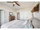 Spacious bedroom featuring hard wood floors and large closet with sliding doors at 11255 S San Adrian Ln, Goodyear, AZ 85338