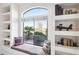 Cozy window seat with desert landscaping view and decor at 11255 S San Adrian Ln, Goodyear, AZ 85338