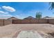 An empty, very large backyard with desert landscaping at 12233 W Aster Dr, El Mirage, AZ 85335