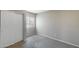 Neutral bedroom with carpet, baseboards, and window for natural light at 12233 W Aster Dr, El Mirage, AZ 85335