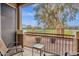 Cozy balcony with patio furniture and view of well-maintained grounds and nearby apartment buildings at 1335 E June St # 107, Mesa, AZ 85203