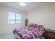 Cozy bedroom with natural light and comfortable furnishings at 1335 E June St # 107, Mesa, AZ 85203