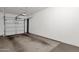 Spacious garage with an automatic door opener and ample room for parking and storage at 1335 E June St # 107, Mesa, AZ 85203