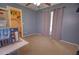 Neutral bedroom with plush carpeting and an adjacent closet offers a peaceful retreat at 1556 E Gabrilla Dr, Casa Grande, AZ 85122