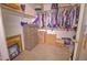 Walk-in closet with built-in shelves and rod provides ample storage space at 1556 E Gabrilla Dr, Casa Grande, AZ 85122