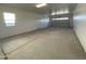 Spacious two car garage with an automatic overhead door at 15801 W Cielo Grande Ave, Surprise, AZ 85387