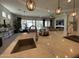 Spacious kitchen with stainless steel appliances, large island and open floor plan perfect for entertaining at 15801 W Cielo Grande Ave, Surprise, AZ 85387