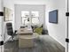 Bright home office with wood floors, a modern desk, and ample natural light at 15801 W Cielo Grande Ave, Surprise, AZ 85387