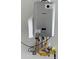 Modern Rinnai tankless water heater with copper piping and digital controls at 15801 W Cielo Grande Ave, Surprise, AZ 85387