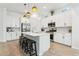 Modern kitchen featuring stainless steel appliances, center island and ample countertop space at 16852 W Creedance Blvd, Surprise, AZ 85387