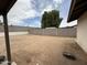 The backyard has desert landscaping with a rock feature ready for you to make your own at 1804 W Kristal Way, Phoenix, AZ 85027