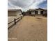 Wide shot of home, detached garage, and fenced in backyard at 1804 W Kristal Way, Phoenix, AZ 85027