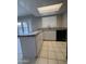 Kitchen island with sink and dishwasher at 1804 W Kristal Way, Phoenix, AZ 85027