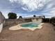 Backyard pool with fence. Perfect for summer fun and relaxation at 1804 W Kristal Way, Phoenix, AZ 85027
