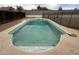 Backyard pool with surrounding concrete offers a refreshing escape at 1804 W Kristal Way, Phoenix, AZ 85027