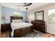Bright bedroom featuring wood floors, modern furniture, and great natural lighting at 1912 S Colt Dr, Gilbert, AZ 85295