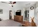 Spacious main bedroom with hardwood floors, and ensuite bathroom at 1912 S Colt Dr, Gilbert, AZ 85295