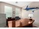 Comfortable office space with large desk, filing cabinets, and natural light at 1912 S Colt Dr, Gilbert, AZ 85295