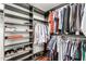 Organized walk-in closet with ample shelving and hanging space at 1912 S Colt Dr, Gilbert, AZ 85295