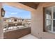 Balcony view showcasing the surrounding townhome community with blue skies, offering a serene outdoor space at 19475 N Grayhawk Dr # 2151, Scottsdale, AZ 85255