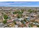 Neighborhood aerial showcasing the layout of the community, nearby green spaces, and city views at 2122 W Virginia Ave, Phoenix, AZ 85009