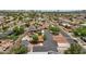 Neighborhood aerial displaying a variety of home styles and landscaping features, with a pool nearby at 2122 W Virginia Ave, Phoenix, AZ 85009