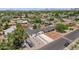 Aerial view of property showcasing fresh exterior paint, desert landscaping, and neighborhood charm at 2122 W Virginia Ave, Phoenix, AZ 85009